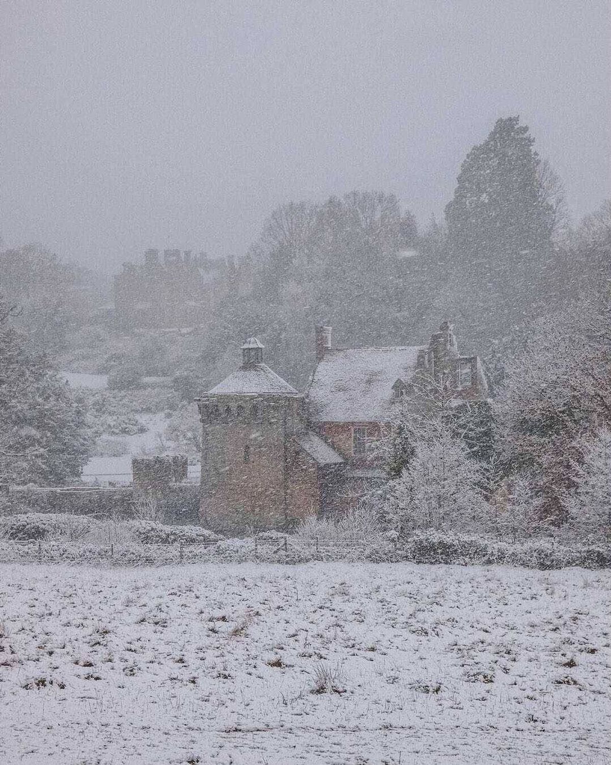 Scotney Castle near Tunbridge Wells in a snow blizzard