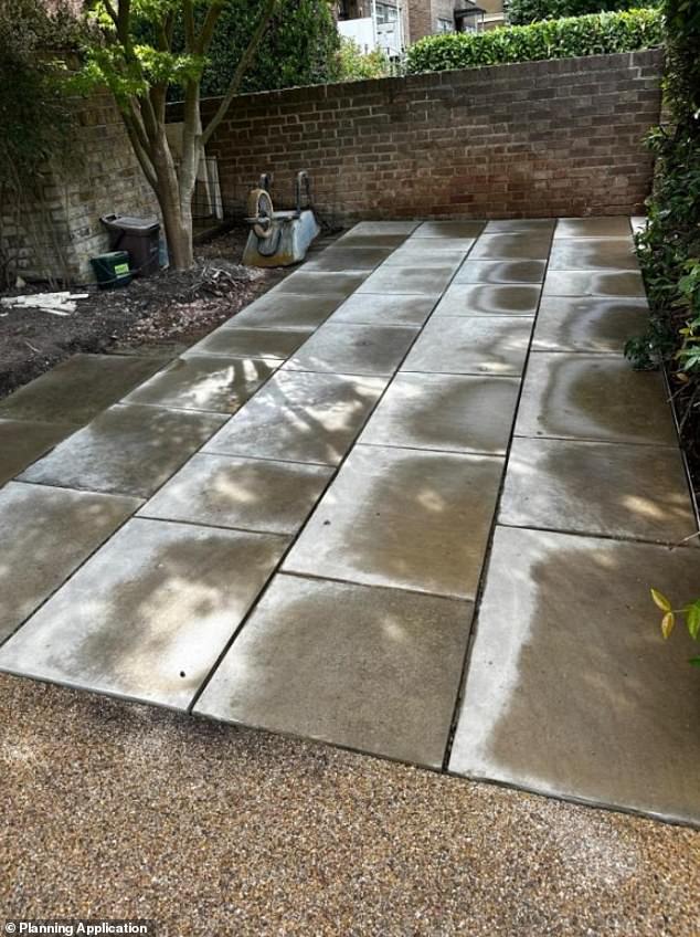 Pictured: Paving works carried out at James Corden's house in Belsize Park, Hampstead