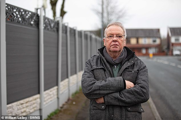 Mr Hopwood said it would be 'terrible' if they had to pull down the fence, adding the ‘whole ordeal has been very stressful’