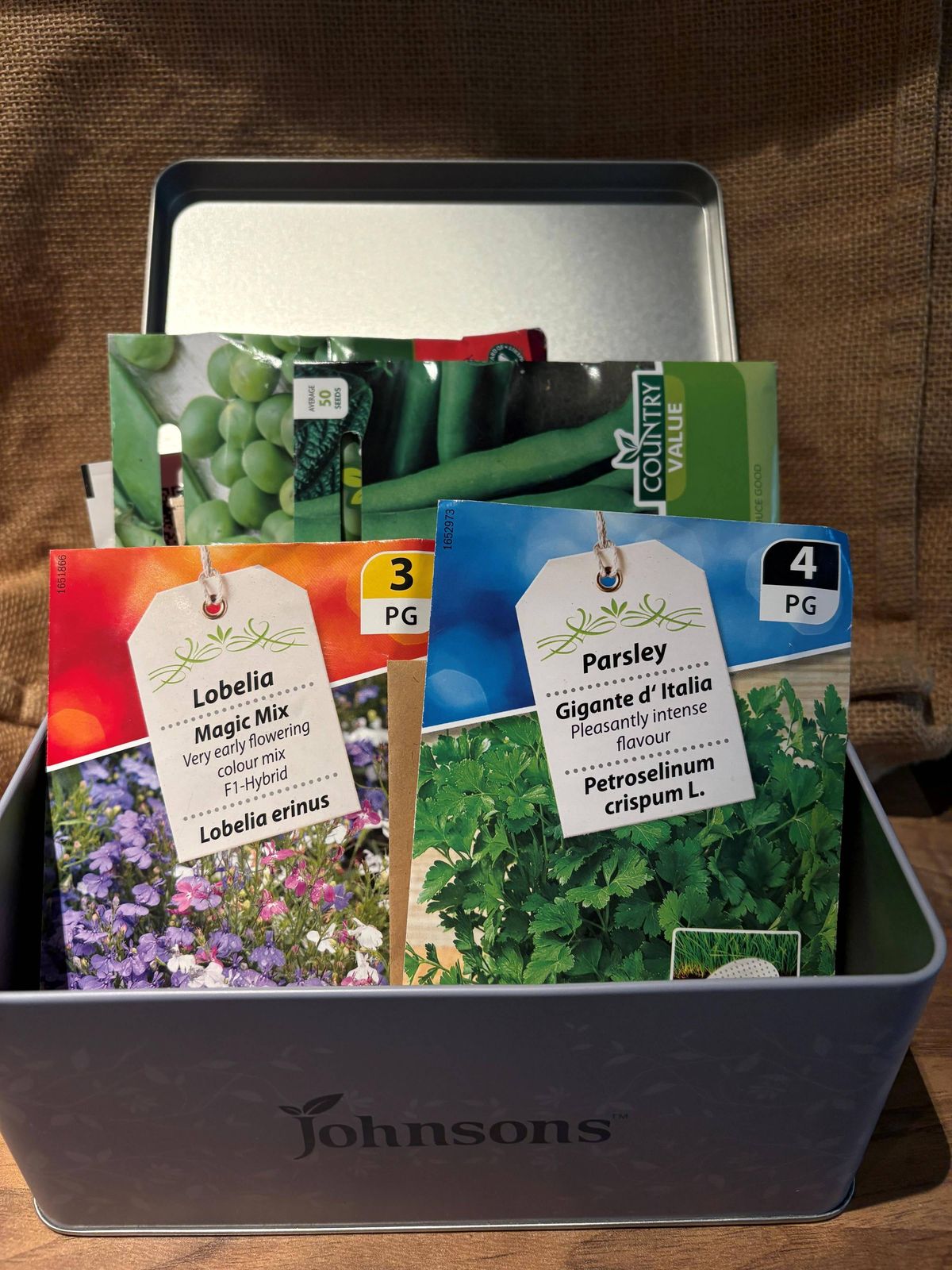Seed packets in a tin