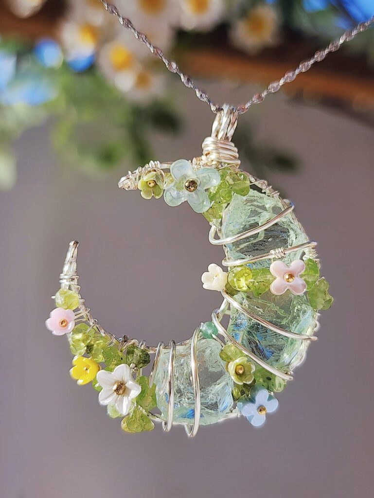 A moon pendant inspired by the first hints of spring. what do you think?