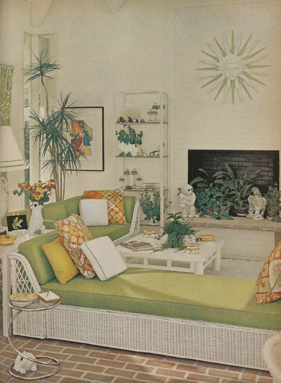 living room with green sofa decorative elements and plants