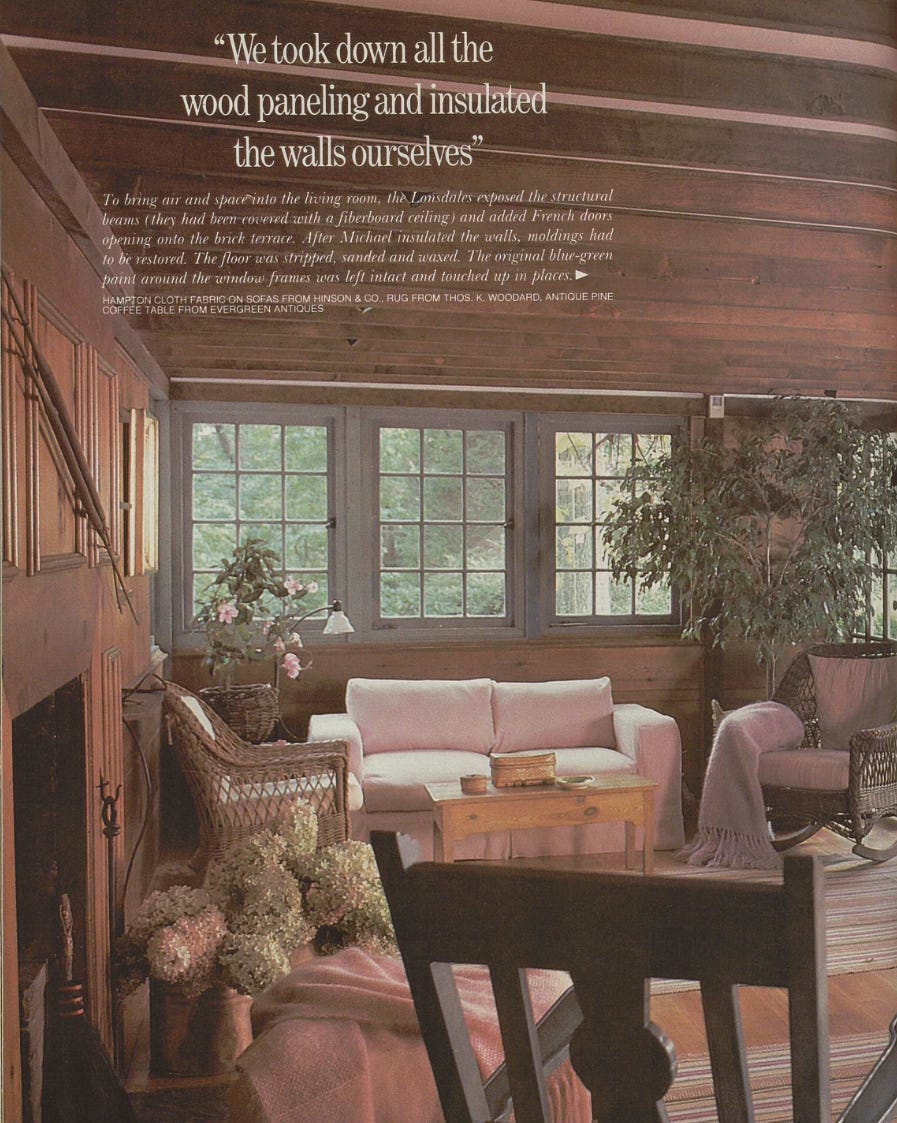 living room with exposed wood beams lightcolored furniture and decorative plants