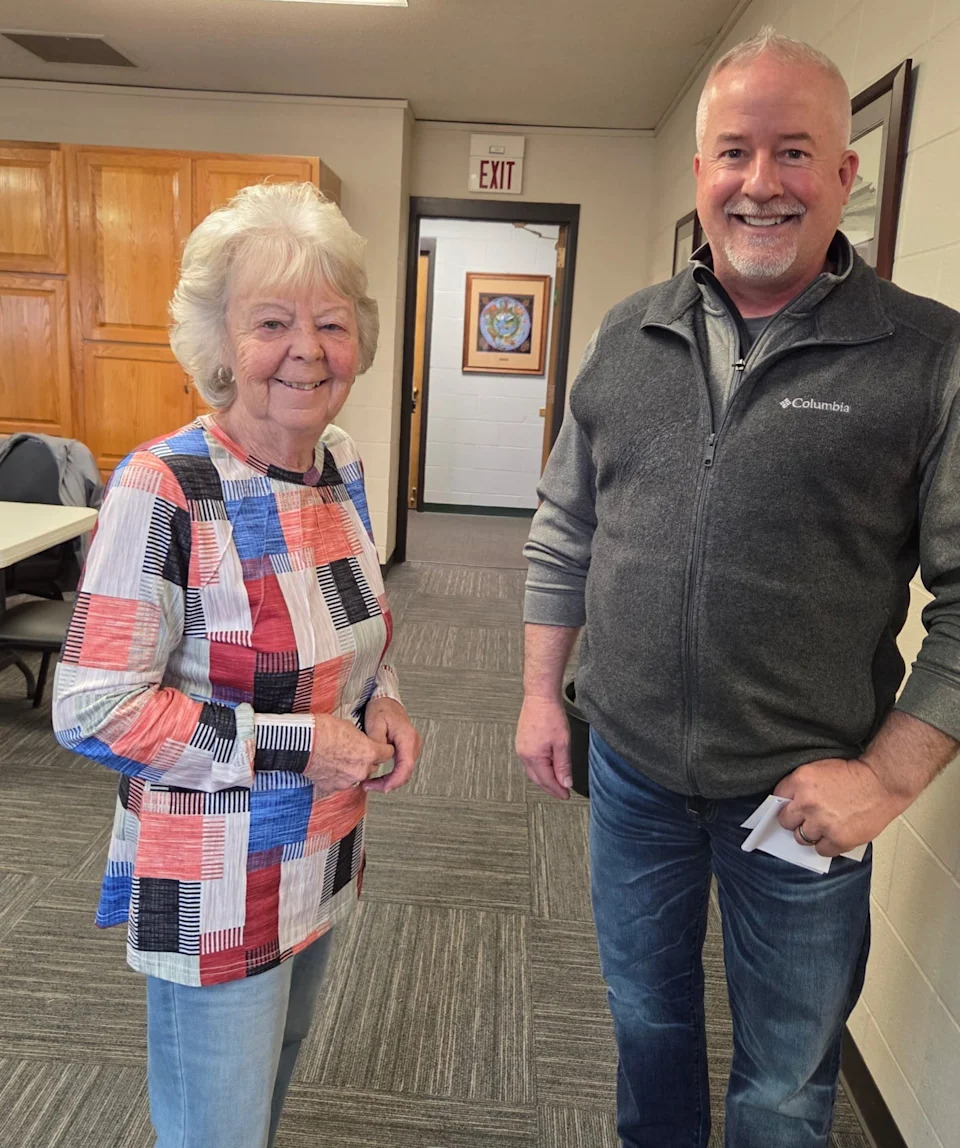 Art of Gardening treasurer Rosemary Caster follows up with guest speaker Todd Bowman on pruning tips.