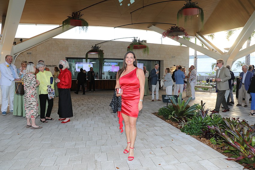 Lisa Jayne Warren-Wallace wows the garden with fresh red vibes.