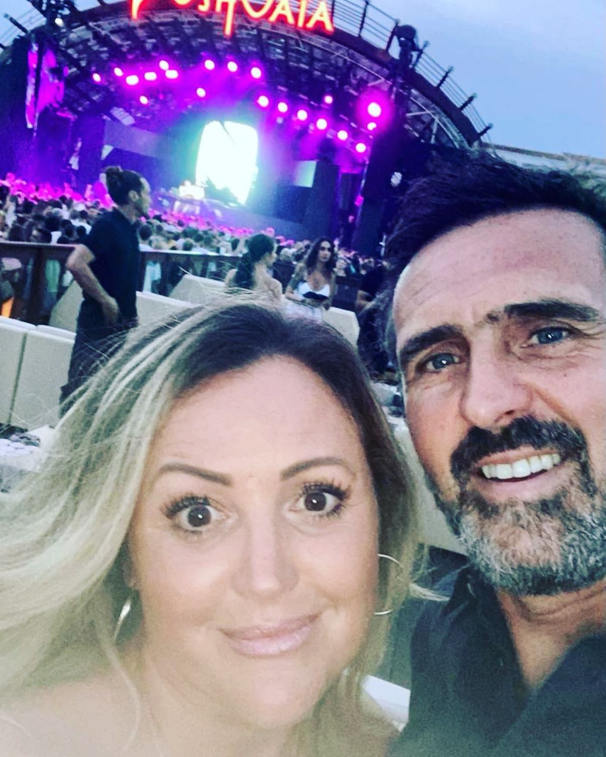 adam frost and his wife in concert stadium selfie