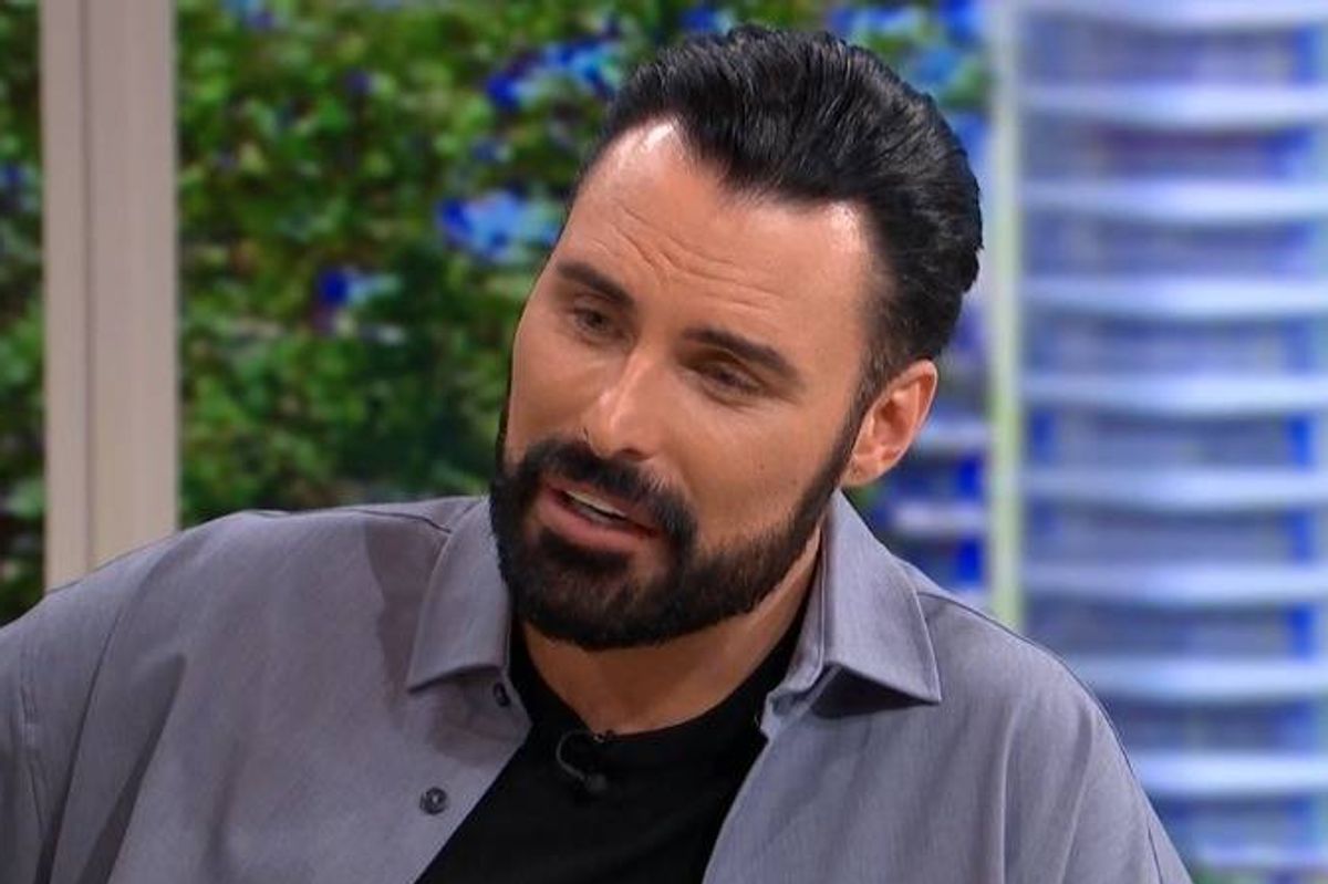 Rylan Clark wearing a grey shirt and black t-shirt