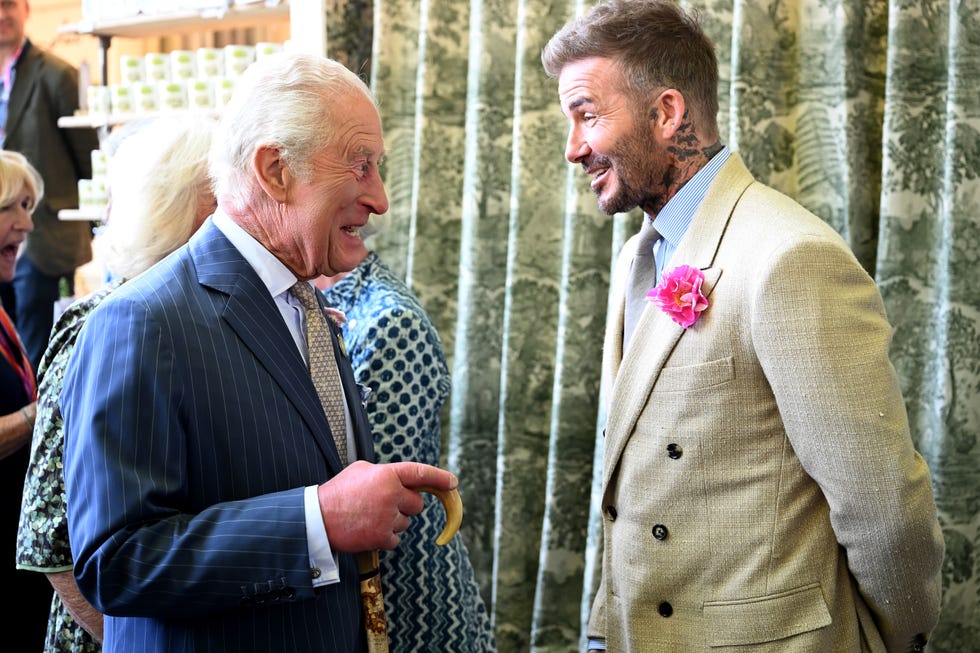 commission mccli0013949 assignedsection: news domesticdetails: press day at chelsea flower show.picture shows hm king charles iii and hm the queen camilla visiting the flower show also meeting david beckhama an ambassadorof the kings foundation at the highgroveshopstand