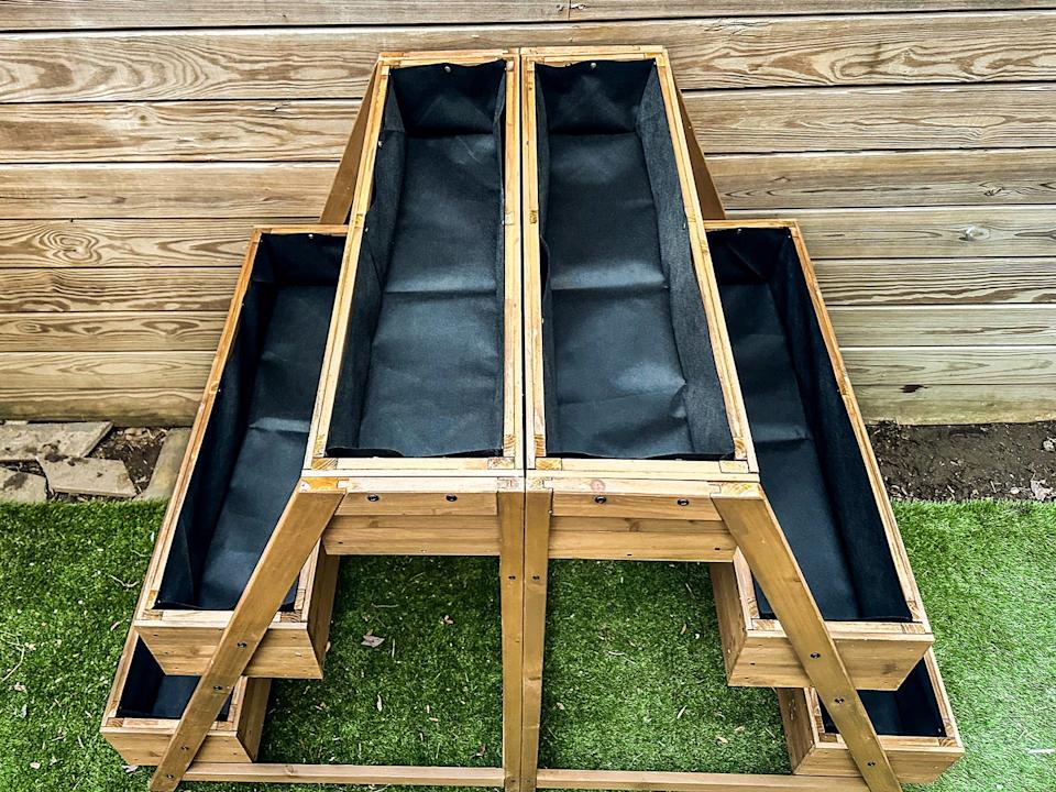 wooden raised planter with multiple compartments