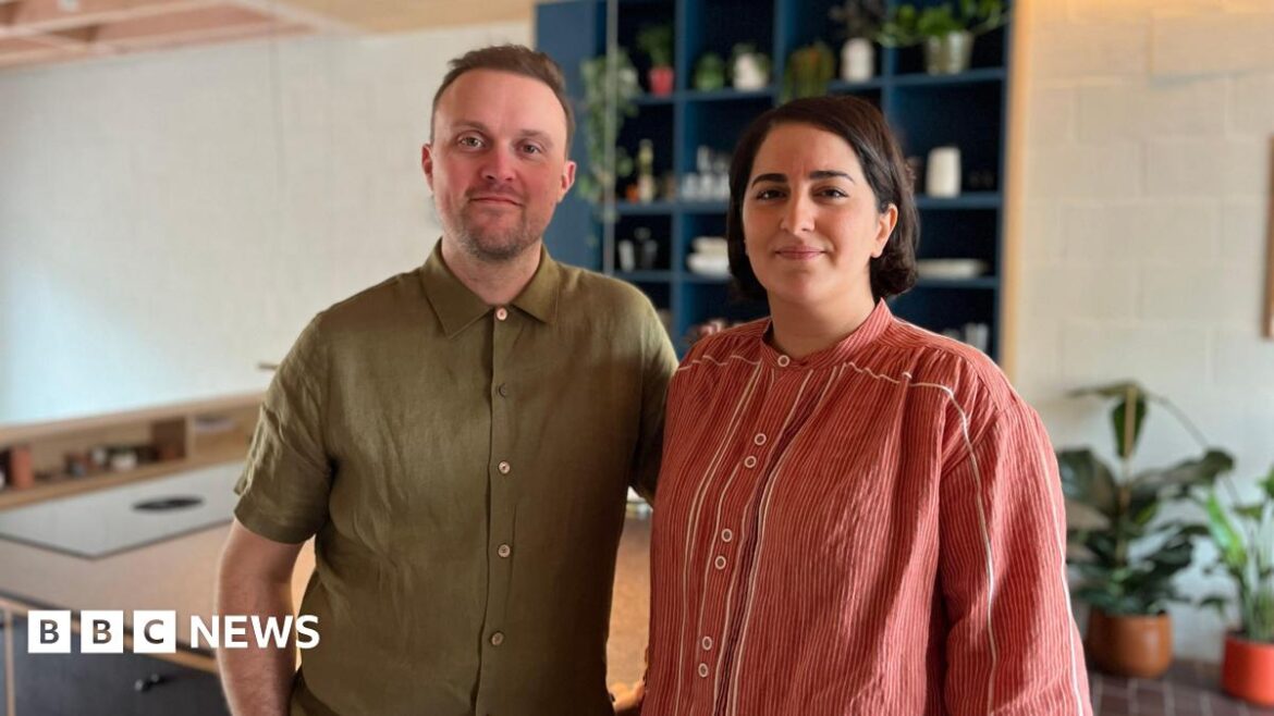 The home hidden in the garden of a Catford terrace house Picture of Will and Sogand Howard in their kitchen