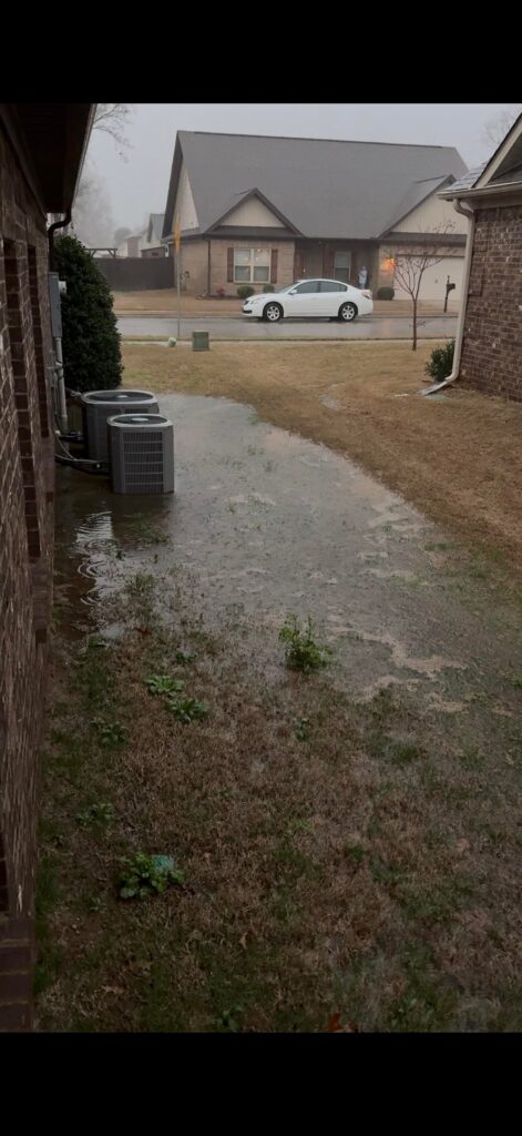 Will properly buried downspouts alleviate the majority of this flooding?