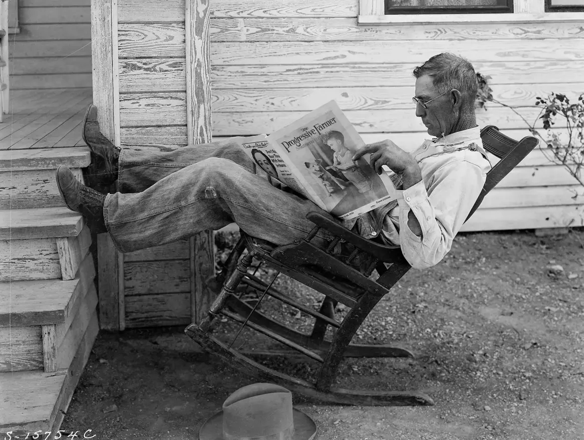 Baseball, Gardening, and the Metaverse A Farmer Reading His Paper. Photographed by George W. Ackerman, Coryell County, Texas, September 1931.