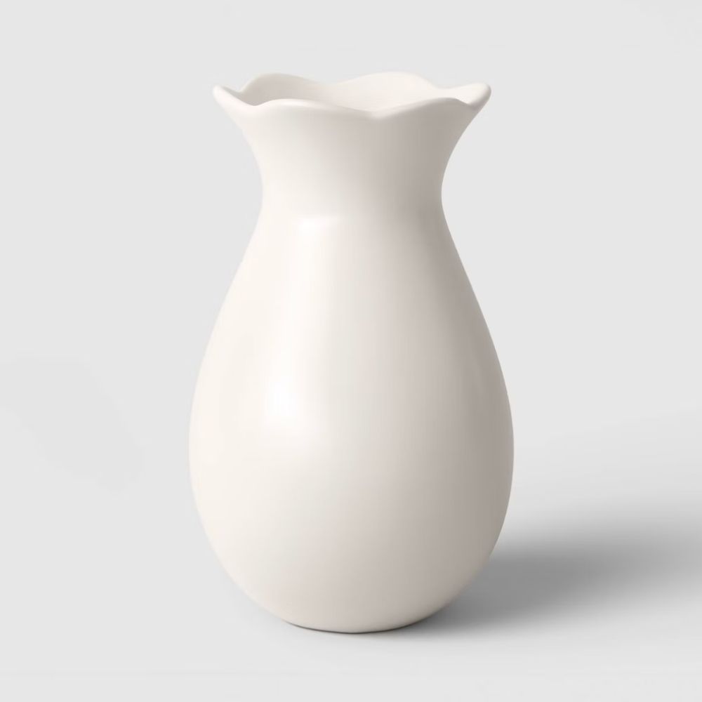 white vase with scalloped neck