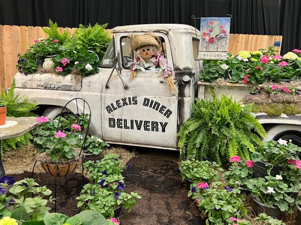 A vintage Alexis Diner truck overflowing and surrounded by flowers in a display from the Cornell Cooperative Extension Master Gardeners at the 2025 Capital Region Flower and Garden Expo. (FILE PHOTO)