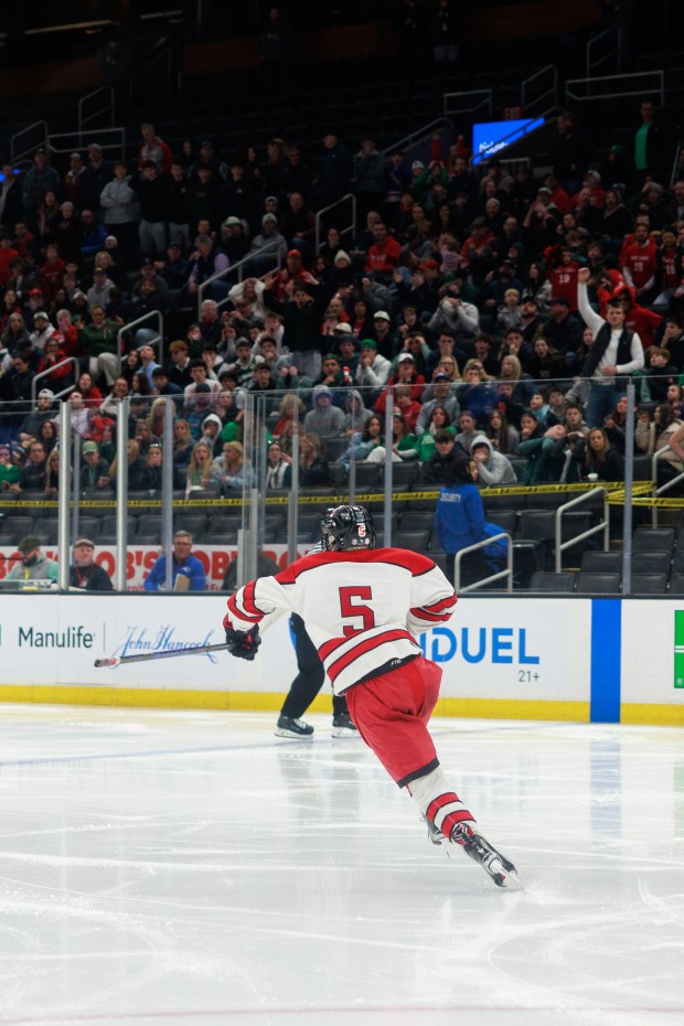 Pope Francis' Luke Latulippe celebrates his game-winning goal in double overtime in the Division 1 boys hockey state title game at TD Garden. (Jake Whiting/Boston Herald)