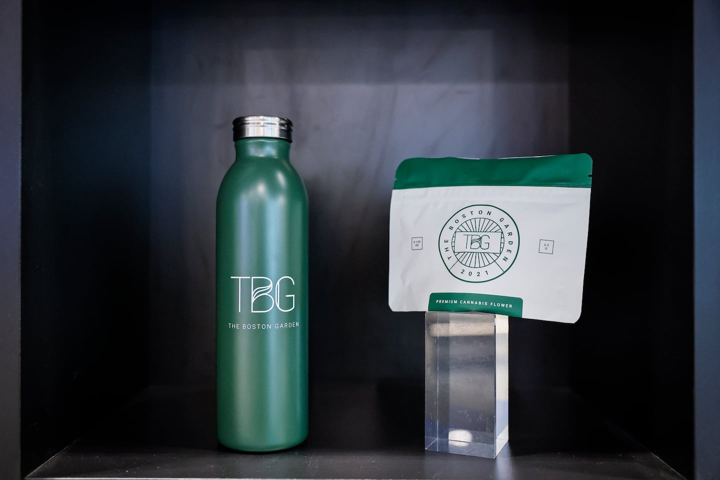 Branded merchandise and cannabis products are displayed inside Boston Garden Dispensary in Cambridge.