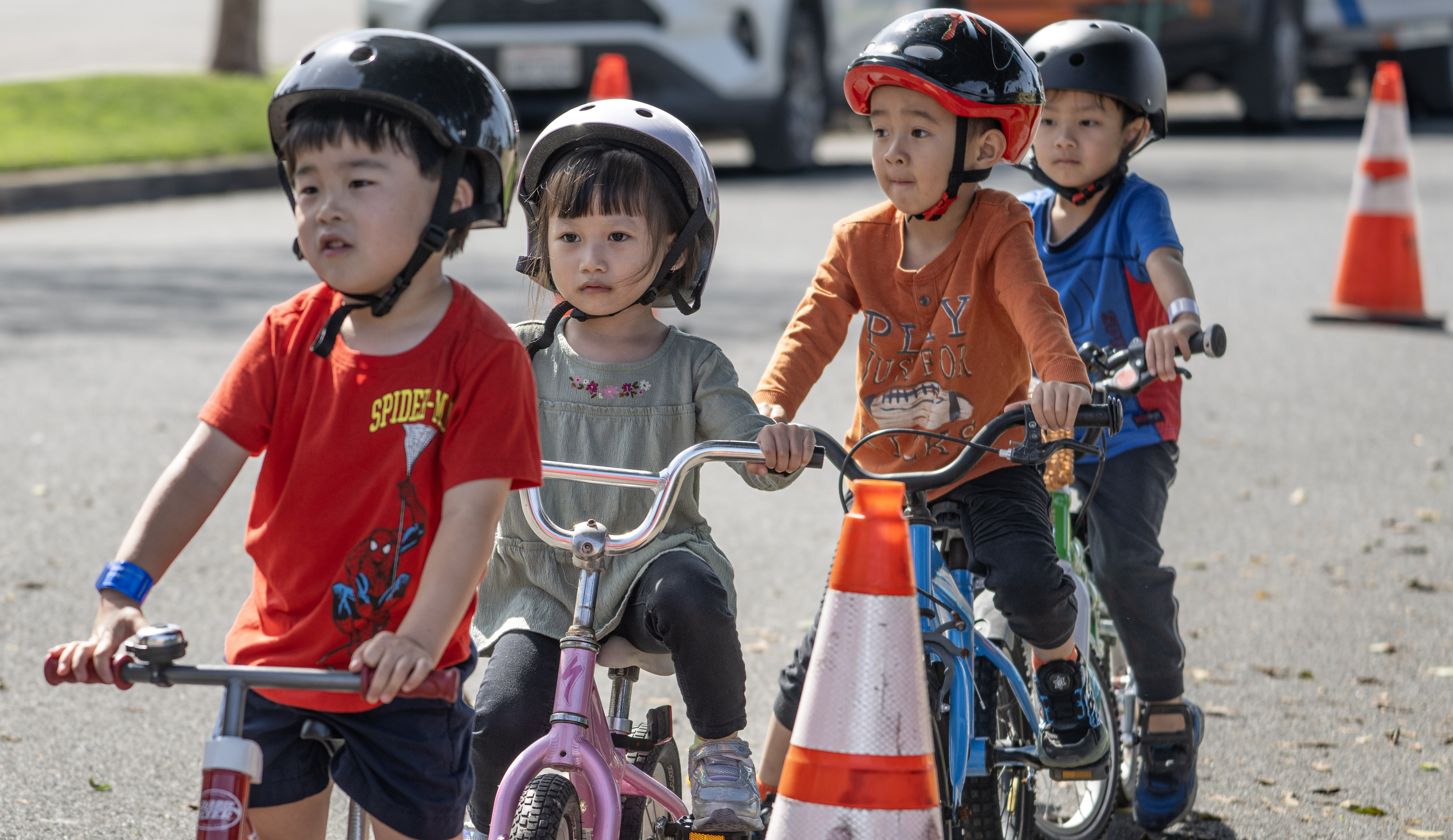 Children line up to test their skills during the first...