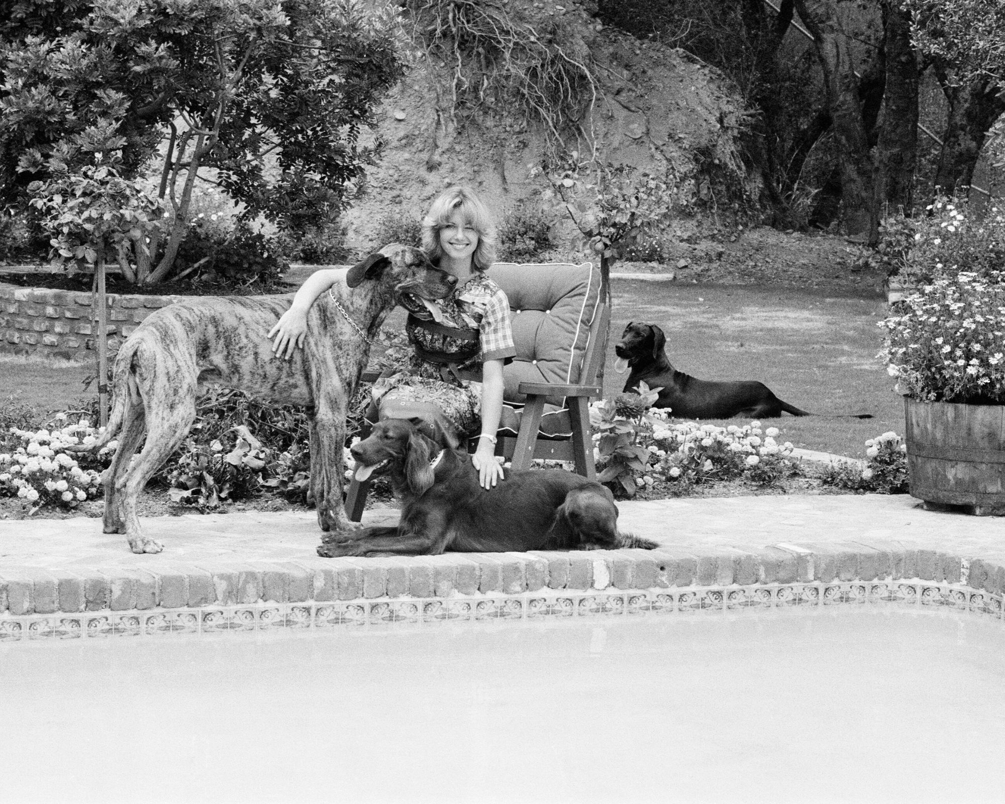 olivia newton-john in her garden in the 70s