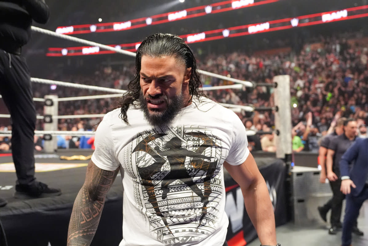 Roman Reigns "snapped" and put CM Punk through the announce table on last week's Raw.Getty Images
