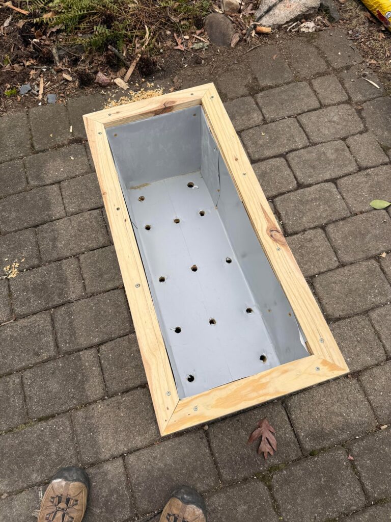Built this herb planter box and used left over aluminum sheeting to line the inside.