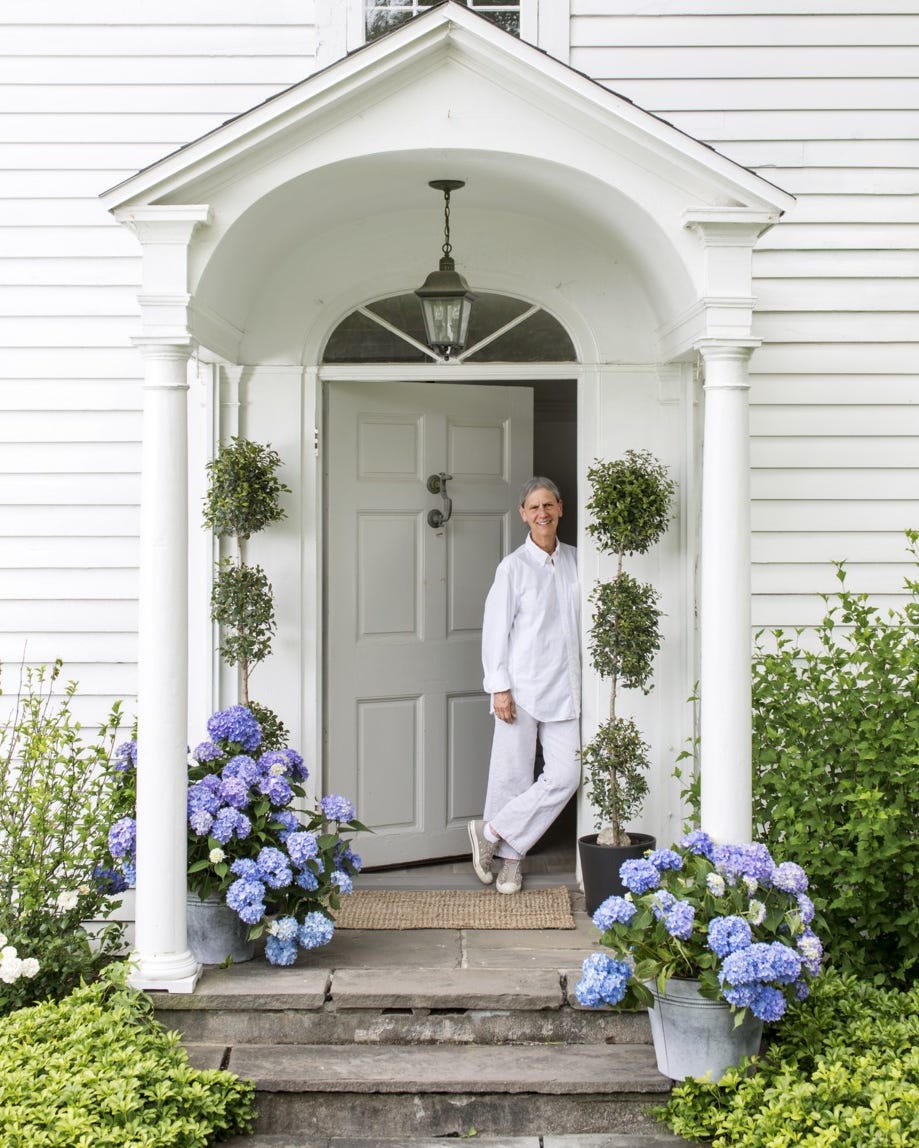 colorful floral front porch ideas front porch of white house with purple hydrangeas