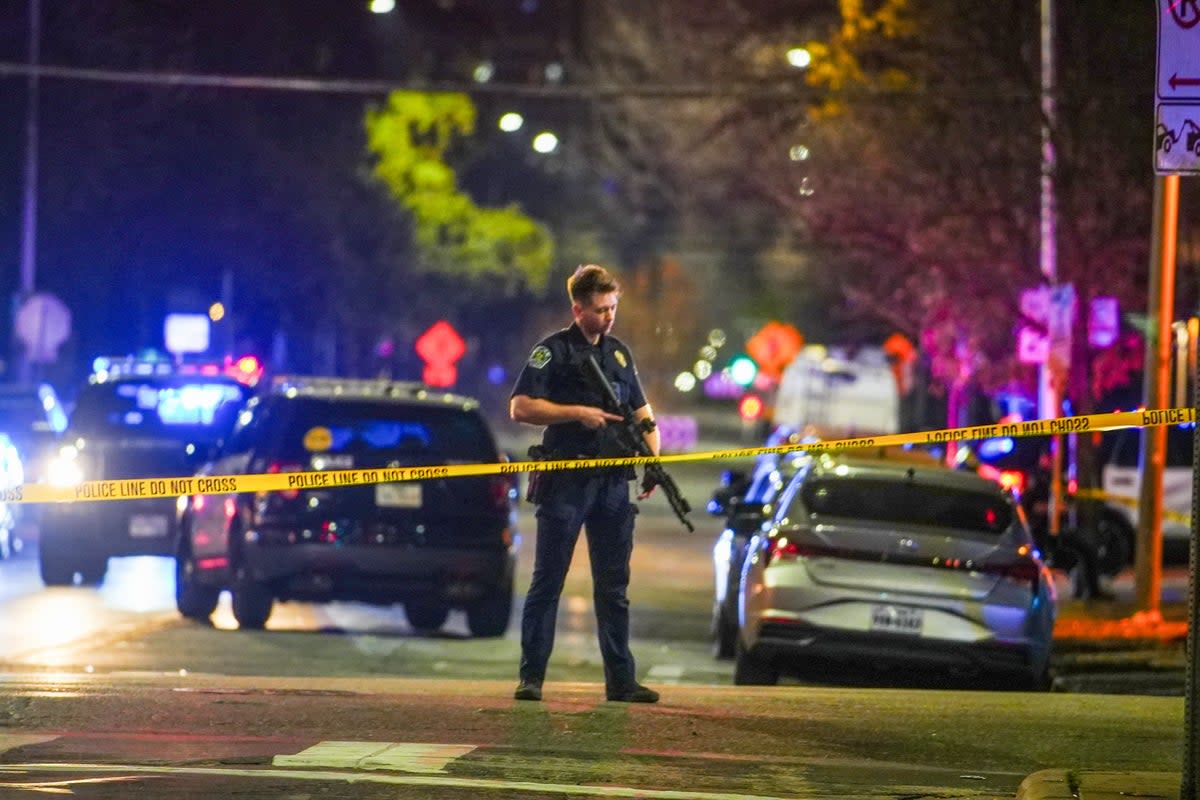 An Austin police officer guards the scene on West 6th Street at West Avenue after a shooting, Sunday March 1, 2026, in Austin, Texas. (American-Statesman)