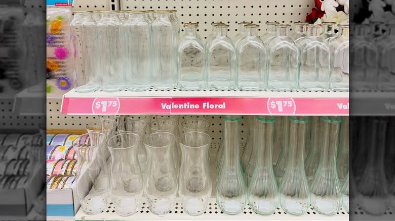 Dollar Tree shelves with glass vases.