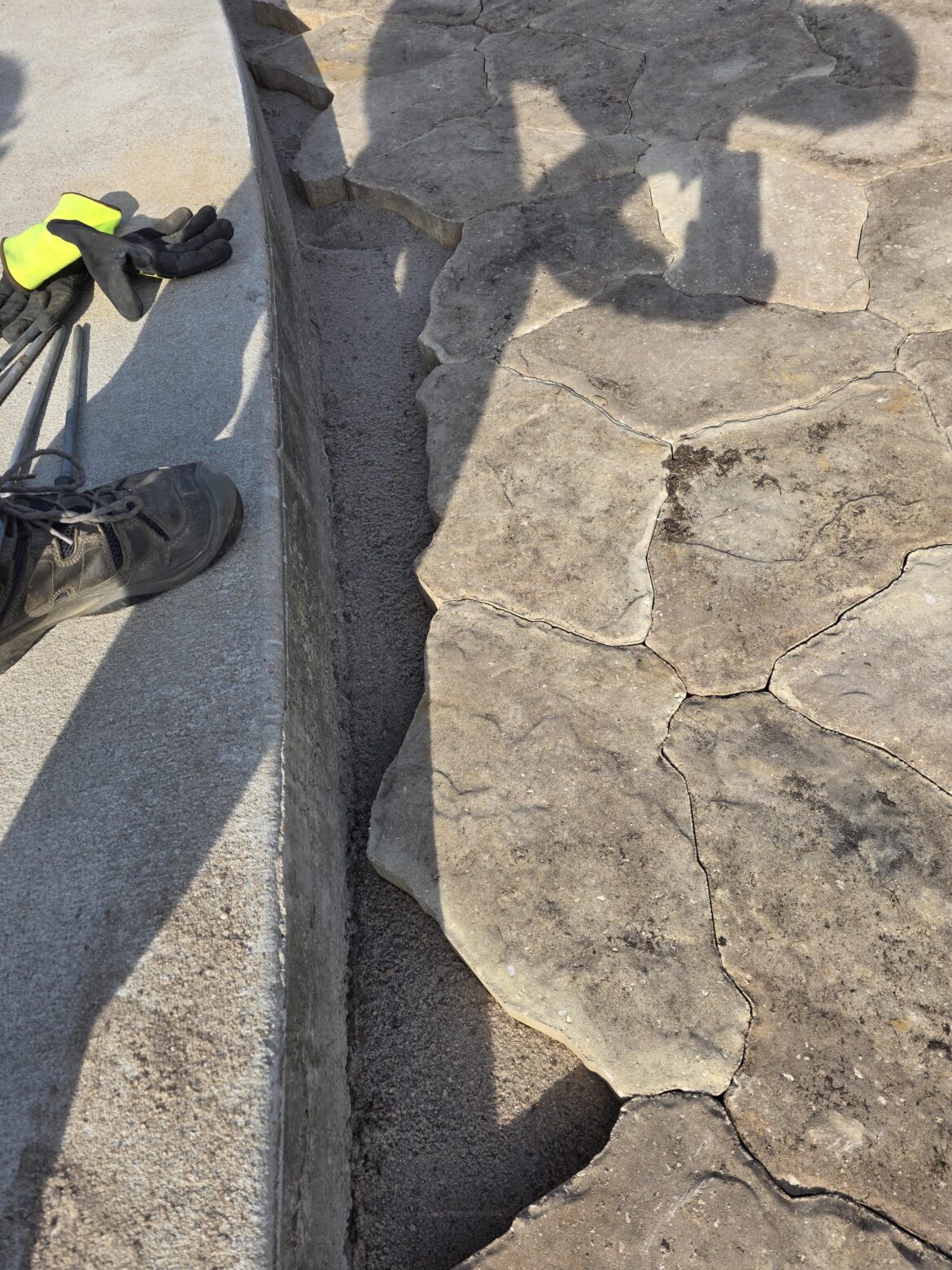 Sandstone pavers, how do I accurately cut these against the step?