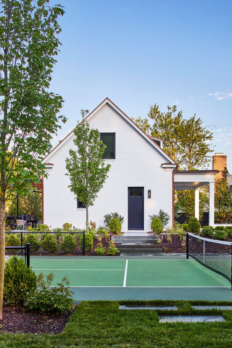 a concrete pickleball court\, topped with pro cushion for better joint comfort.