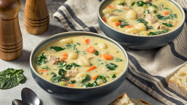 Chicken gnocchi soup in bowls.