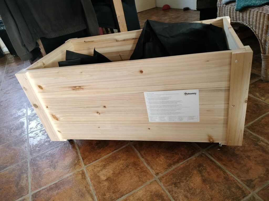 Should i make holes in this mesh for raised beds so water goed through?