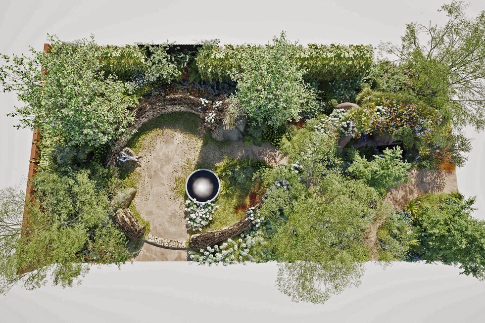 a landscaped garden with a circular stone path and a central water feature