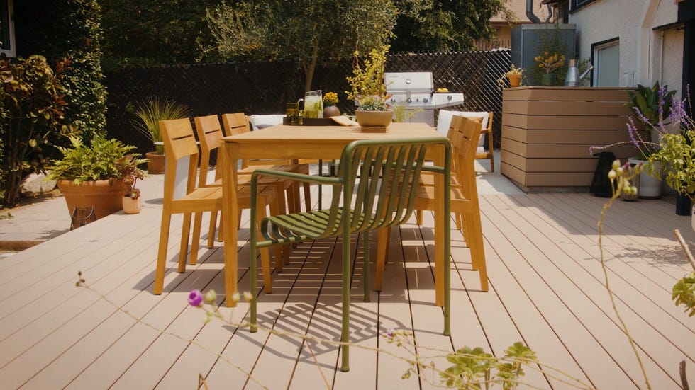 outdoor dining area featuring a wooden table and chairs outdoor dining area featuring a wooden table and chairs