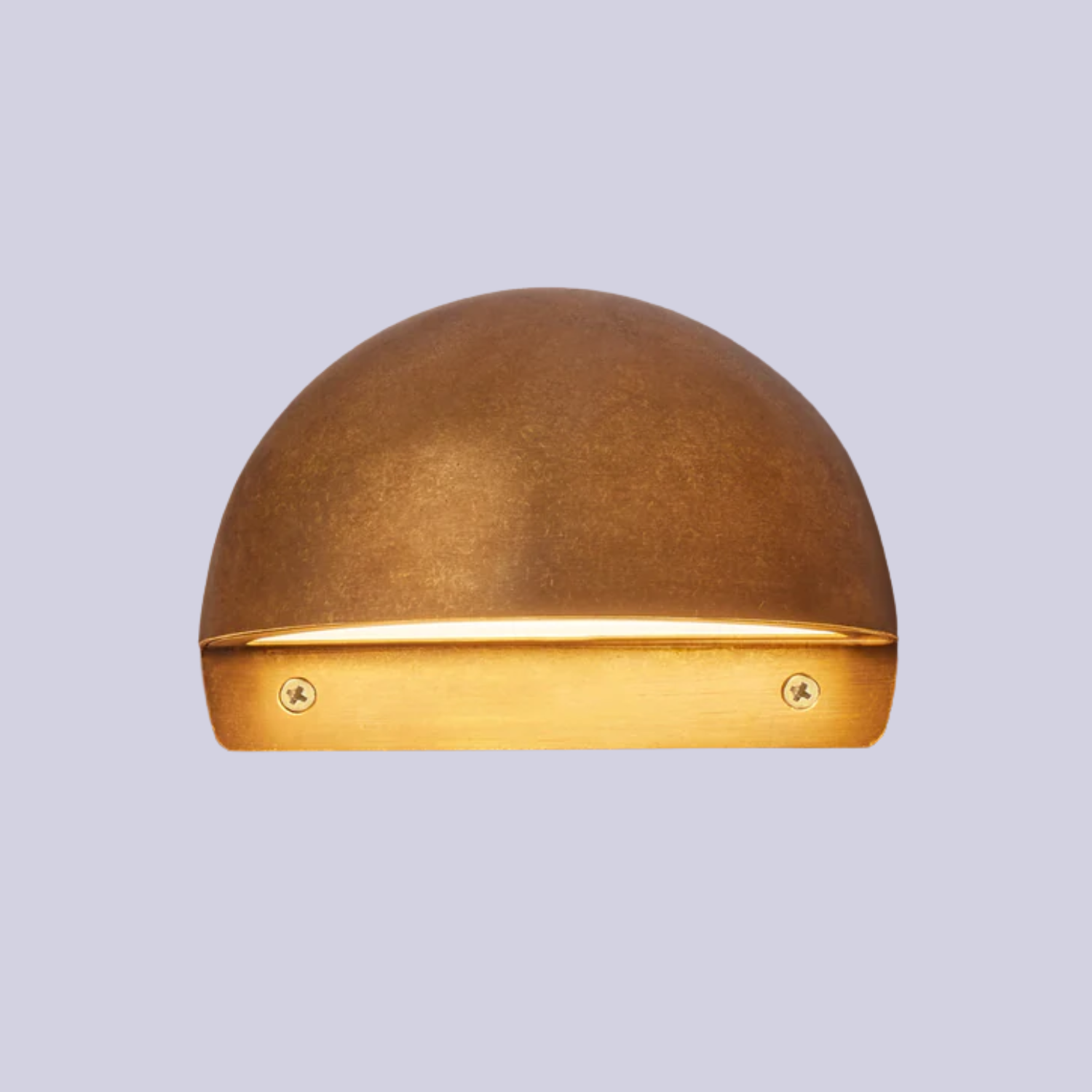 A solid brass outdoor wall light
