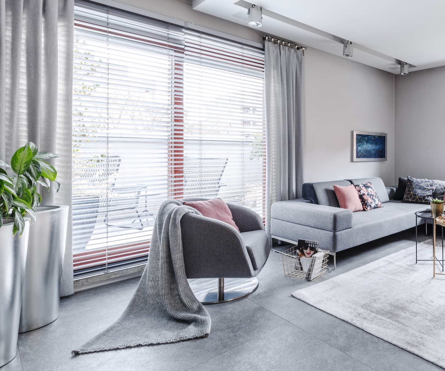 Window with blinds overlooking balcony