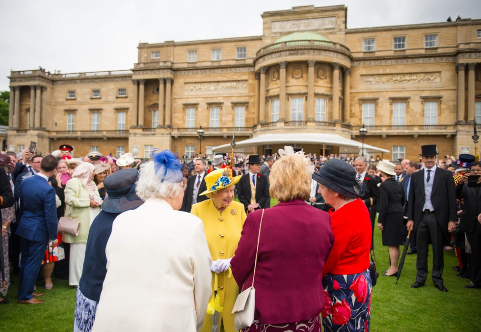 The Queen's Garden Party At Buckingham Palace london, england may 23: queen elizabeth ii greets guests during a garden party at buckingham palace on may 23, 2017 in london, england. a minutes silence was observed for the victims of the manchester terror attack. (photo by dominic lipinski wpa pool / getty images)