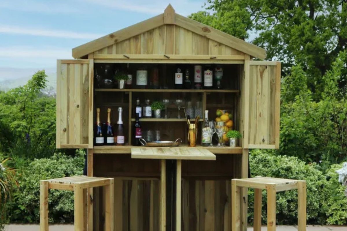 Outdoor bar with two stools