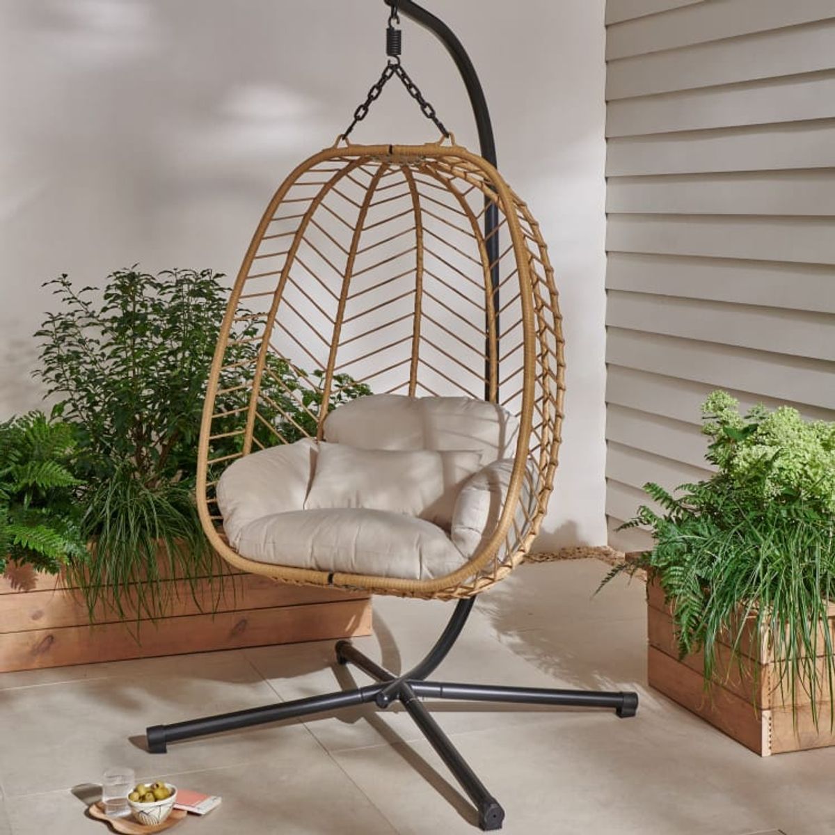 An image of a hanging garden egg chair
