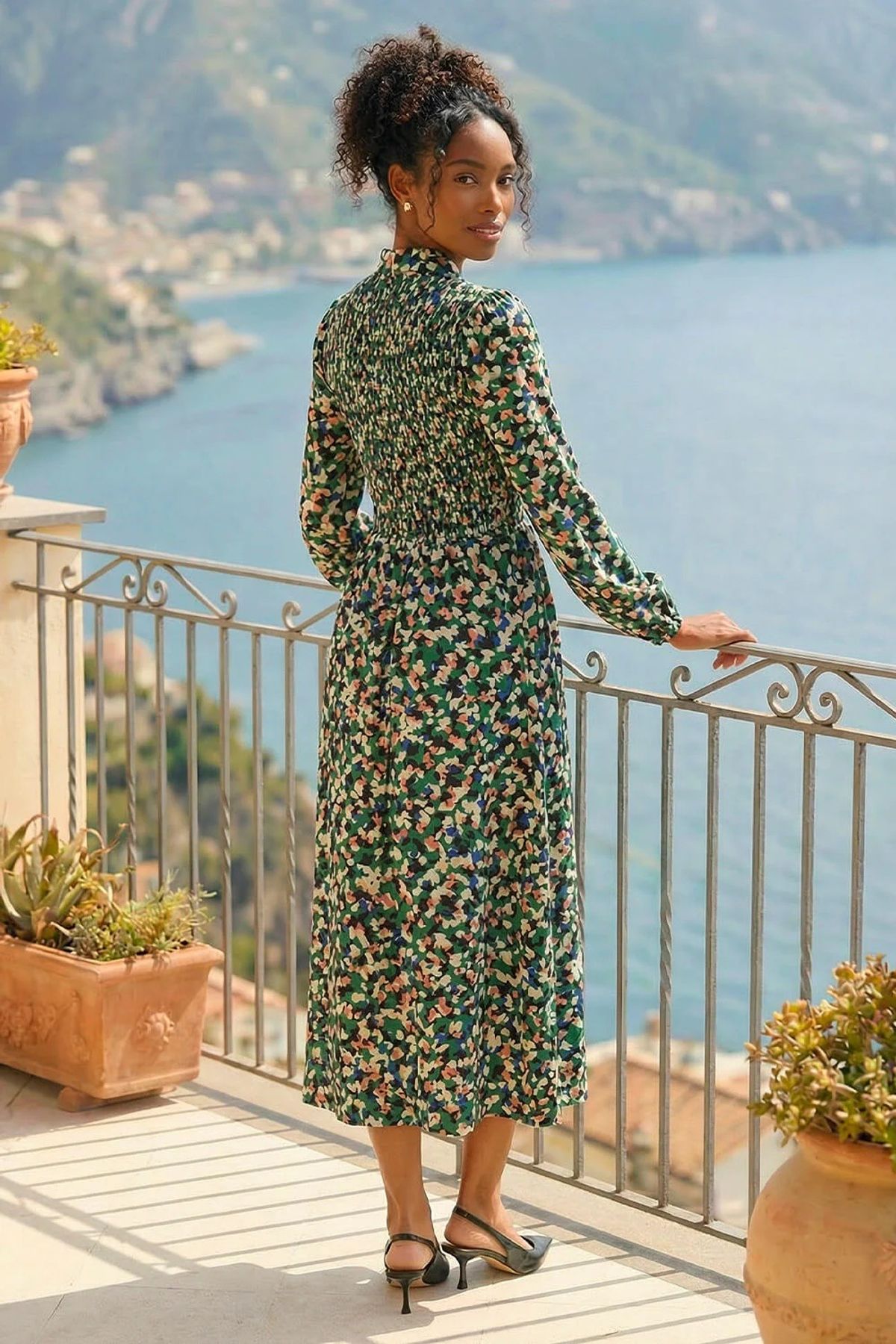 The back of the Green Speckled Print Shirred Midi Dress