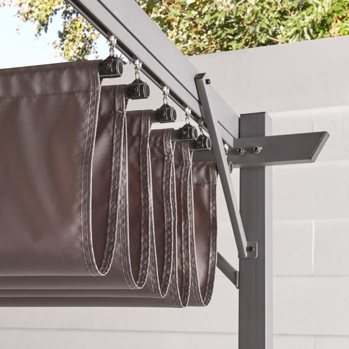 A closeup of a pergola canopy shade