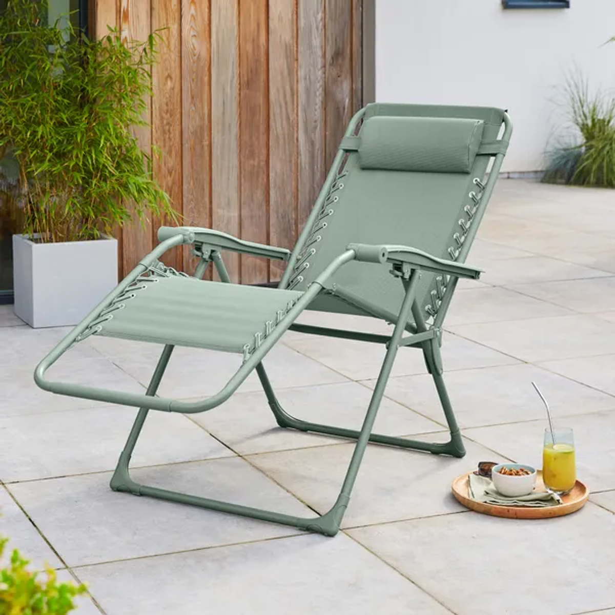The sun lounger comes in five colours including green