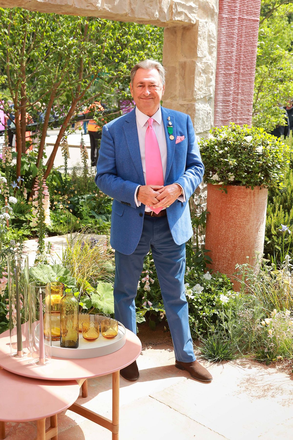 LONDON, ENGLAND - MAY 19: Alan Titchmarsh walks through the Killik & Co 'Save for a Rainy Day' Garden at Chelsea Flower Show on May 19, 2025 in London, England. (Photo by Dave Benett/Getty Images for Killik & Co)