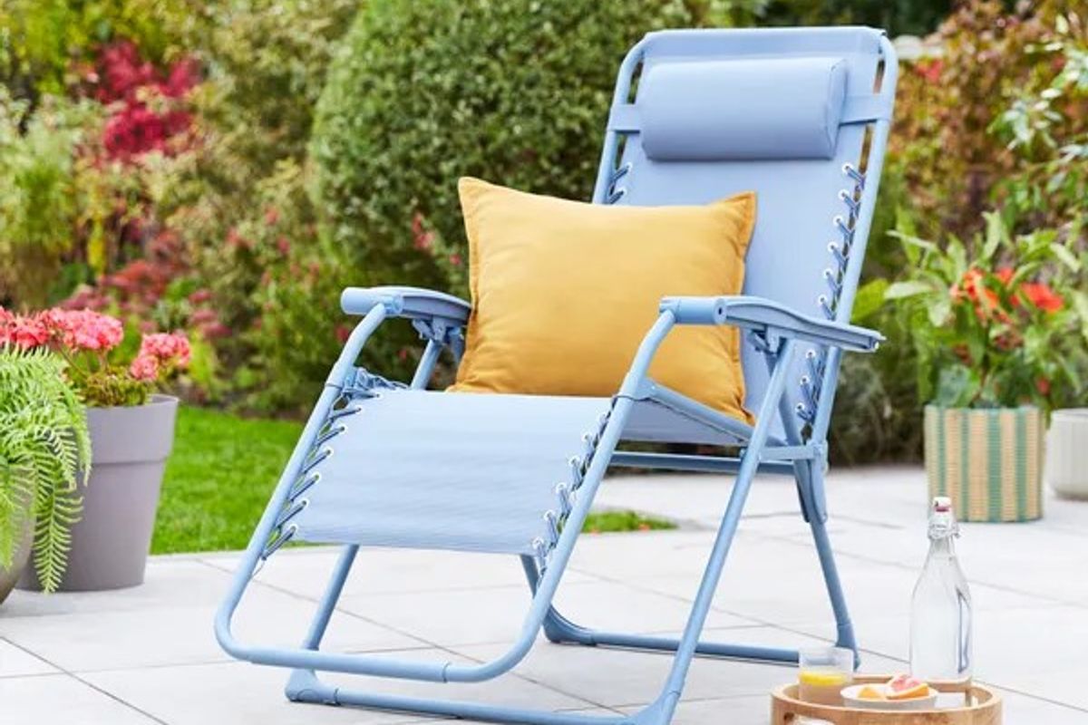 Blue lounger in garden