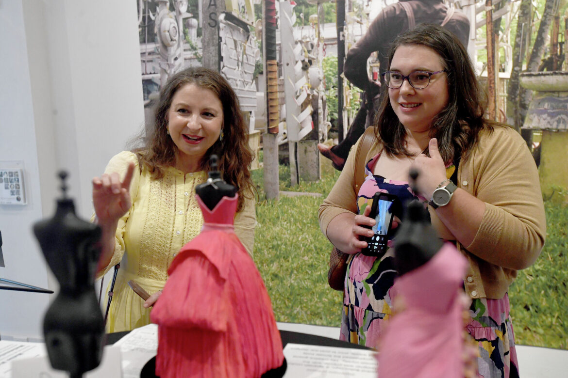 New club member Carol Rienstra (left) and friend Jenny Dornier check out MOD(ern) Musings, this year’s version of Magnolia Garden Club’s biennial flower show, which drew a crowd on its final day at the Art Museum of Southeast Texas. Photo made Wednesday, April 1, 2026 Kim Brent/Beaumont Enterprise staff