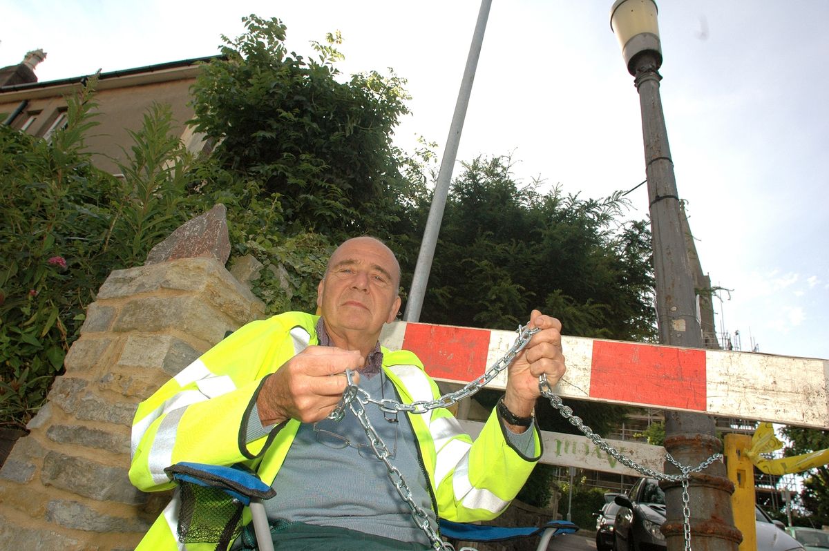 David Cemlyn chained himself to a lampost in St Andrews to save it from beinin taken away by the Council