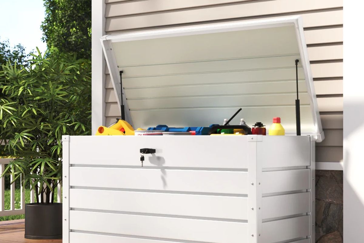 The Living and Home Lockable Steel Storage Box on a decking area