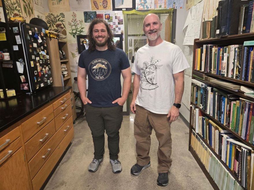 UTC graduate student Andy Wall, left, stands with UTAA Distinguished Service and UC Foundation Professor Joey Shaw in Shaw's campus lab space.