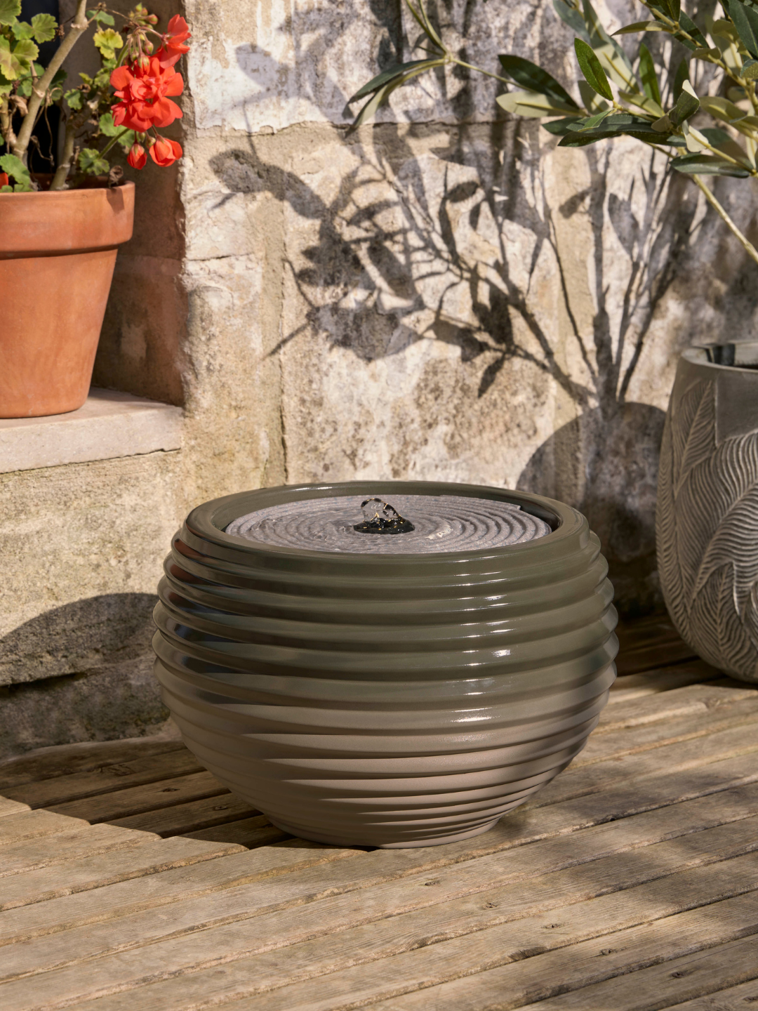 A ribbed green water feature from Cox &amp; Cox