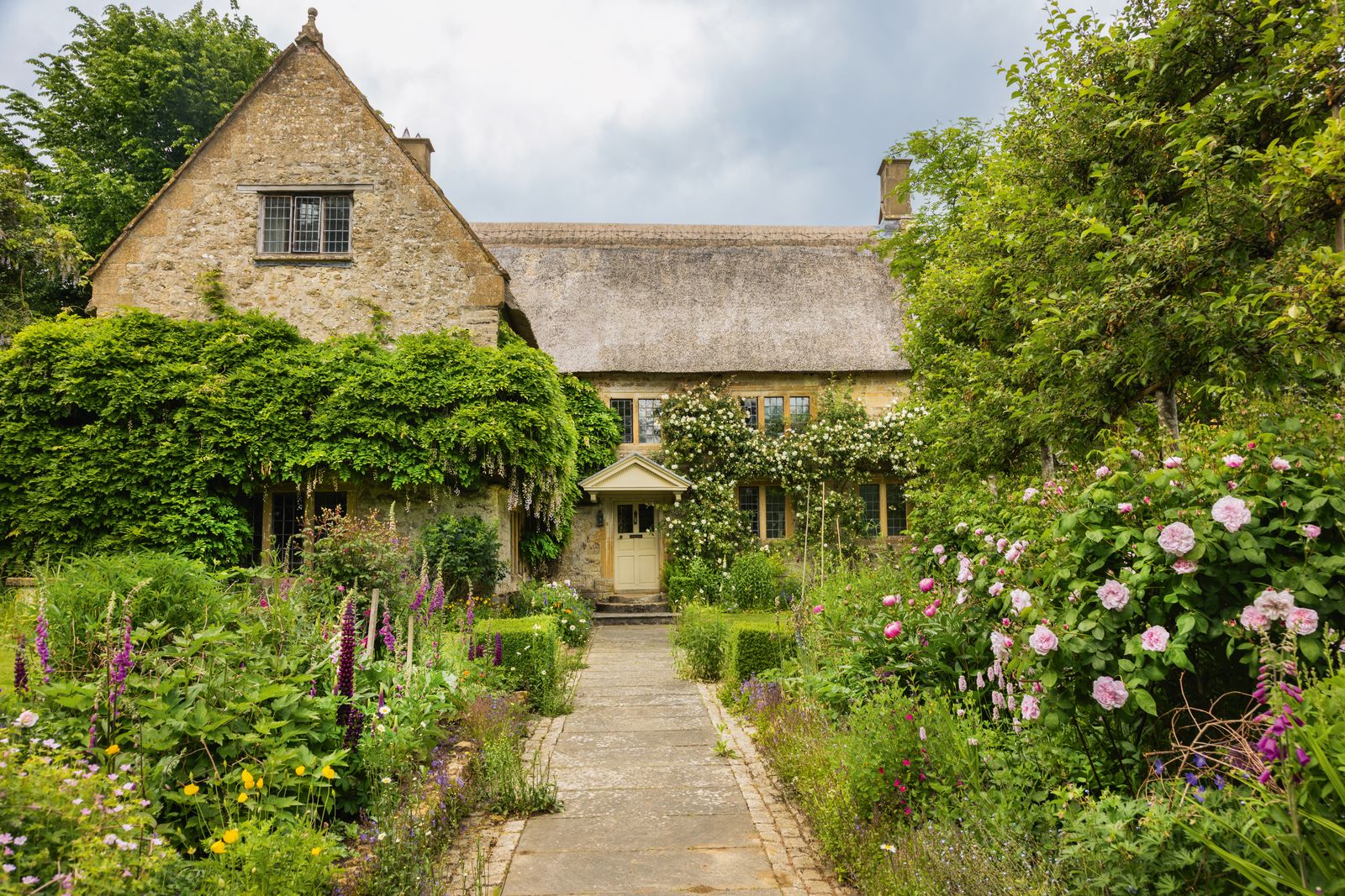 Image may contain Architecture Building Cottage House Housing Outdoors Manor Garden and Nature