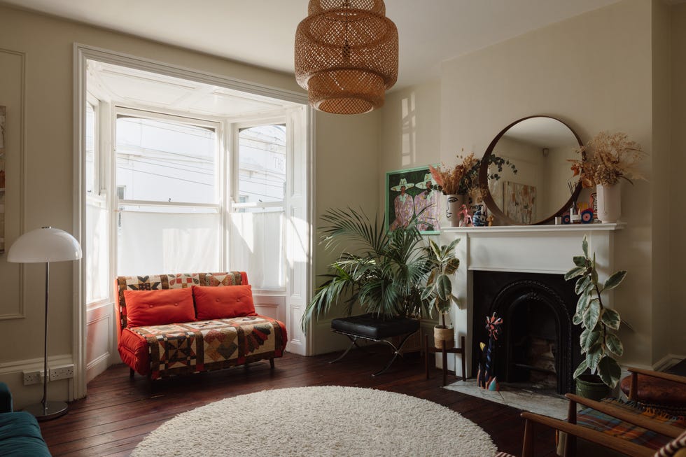 cozy living room with various furniture and decor elements